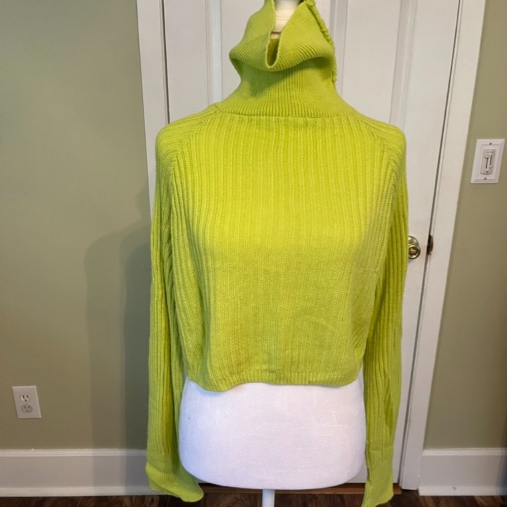 Green turtleneck sweater